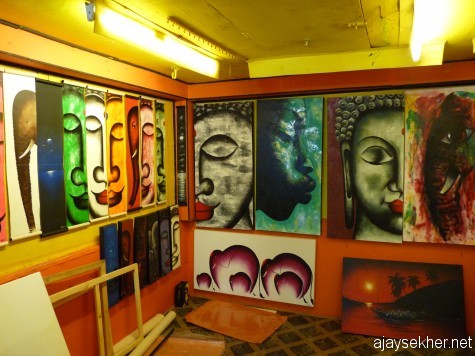 Colours of enlightenment: Various facets of the buddha and his symbol the elephant painted by a north Indian artist in his studio gallery on the cliff at Varkala Papanasam.