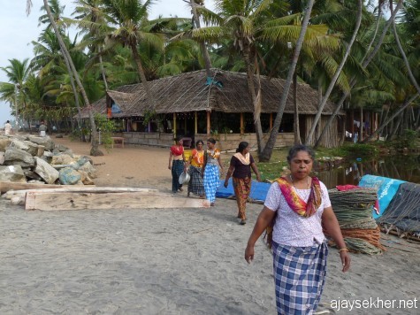 Fisher women coming for work on the morning of 26 Dec 2012. Black Beach, Varkala.