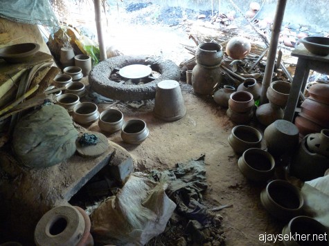 Turning the pot and tilling the land:  Potter's wheel and kiln in a Kumbhara alley in Ezhava Thuruthy by the Perar near Ponnani.
