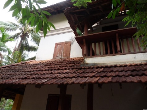 The wooden parakeet on the western balcony at Changaram Komarath house. Early April 2013.