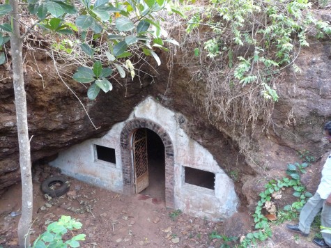 Pariyapuram Buddhist cave.  In the 1930s Bhikshu Dharmaskand installed a new marble statue of the Buddha where an old demolished Buddha idol relic was said to be placed.