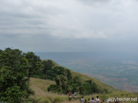 The eastern slopes of the Western Ghats that go down to the Kambam Theni valley in Tamilakam: A view to the north east of Mangaladevi Kottam near Kumaly