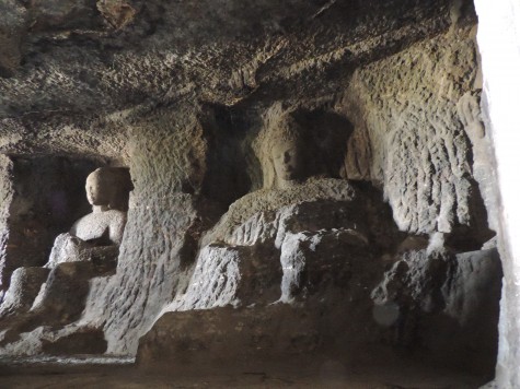 A Buddha bust in Ellora or Elapura.  Such busts were changed to the Mahes bust in Elephanta near