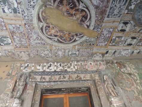 The fabric look alike Shamiana painted onto the cut ceiling  at Ajanta.